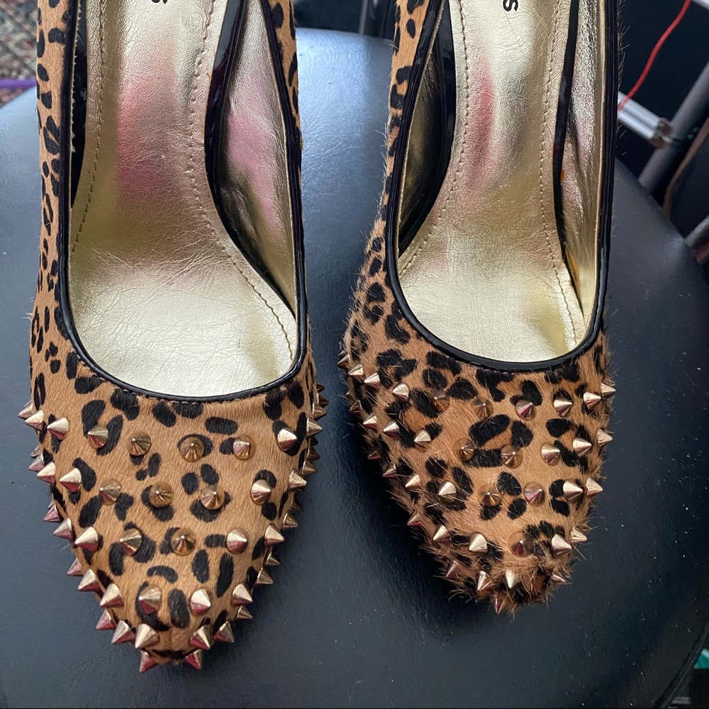 Leopard print 4 “ platform spike front stilettos.